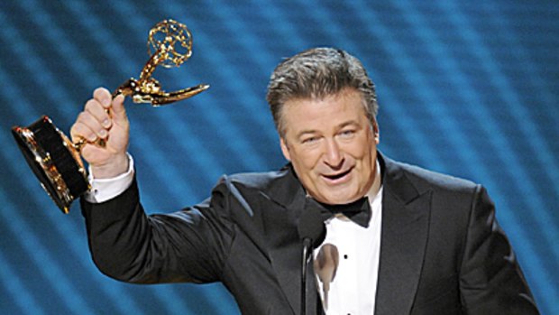 Going out on a high note ... Alec Baldwin accepts the Outstanding Lead Actor Emmy for his performance in 30 Rock.