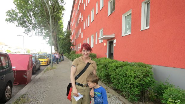 Apprentice carpenter Lea Schmeling with her son Henry outside a 51sqm rental property she, and 30 other groups, had just inspected in Berlin.