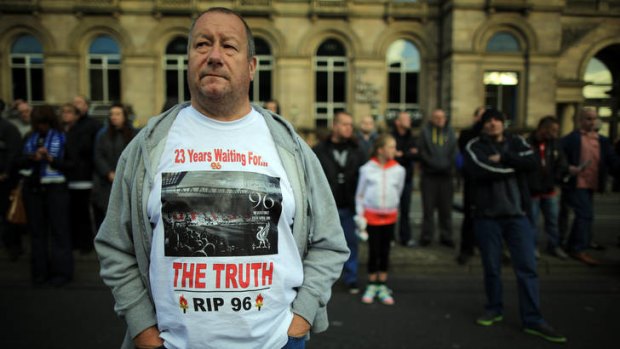 Not forgotten ... people take part in a vigil for the victims of the Hillsborough disaster outside Liverpool's St George's Hall.
