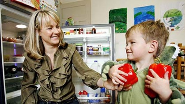 That guilty feeling... Felicity Roche, with her son Gabriel, admits  she wastes   food.