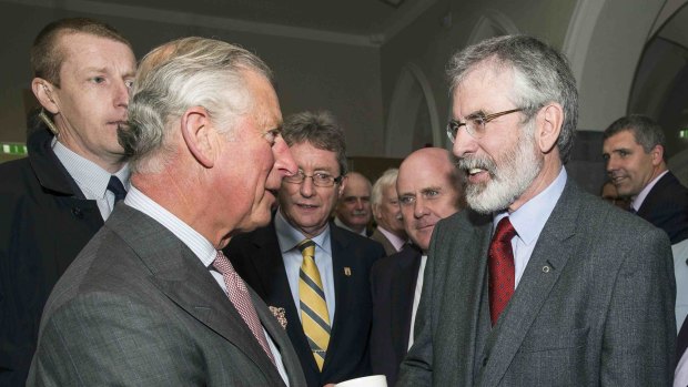 Britain's Prince Charles (left) shakes hands with Gerry Adams at the National University of Ireland in Galway.