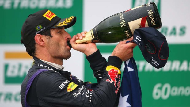 Podium finish: Mark Webber celebrates his final formula one race.