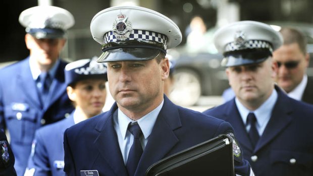 Sergeant Colin Dods (centre) and Senior Constable Richard Blundell (right) arrive at the inquest.