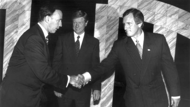 Former Prime Minister John Howard says Australia would be in a "much better economic position" had John Hewson (right) defeated Paul Keating (left) in 1993. They are pictured here with the ABC's Kerry O'Brien prior to a 1993 televised debate.