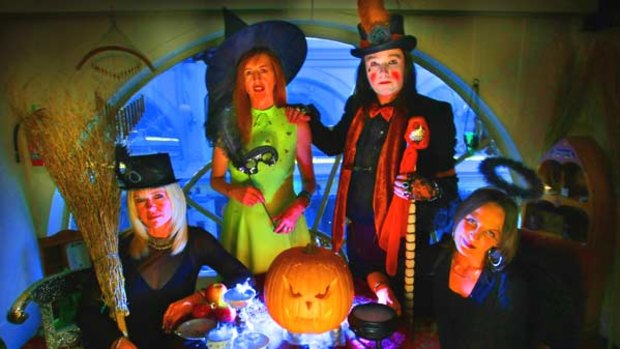 From left: Loretta Shirley, Danae Thorpe, Drew Sinton and Michelle Walker get into the pagan spirit of Halloween.