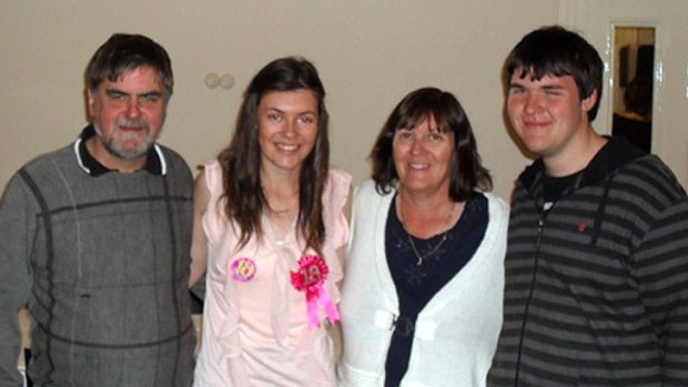 Found dead ... Newsagent Gary Angus, with  daughter Belinda, 18, wife Jenny, and son Tim, 16.
