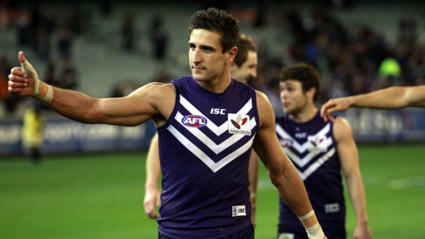 Dockers captain Matthew Pavlich gives the thumbs up to the Freo fans.
