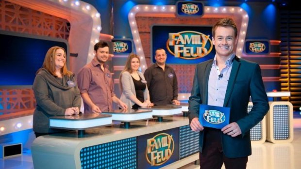 <i>Family Feud</i> host Grant Denyer with contestants.