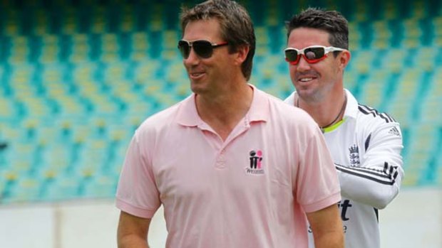 Former Aussie great, Glenn McGrath, shares a joke with English bowler Kevin Petersen before the start of the fifth Test.