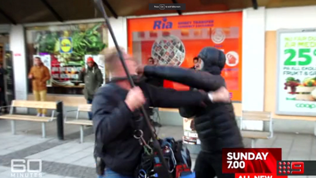 A young man assaults a 60 minute cameraman while the crew .