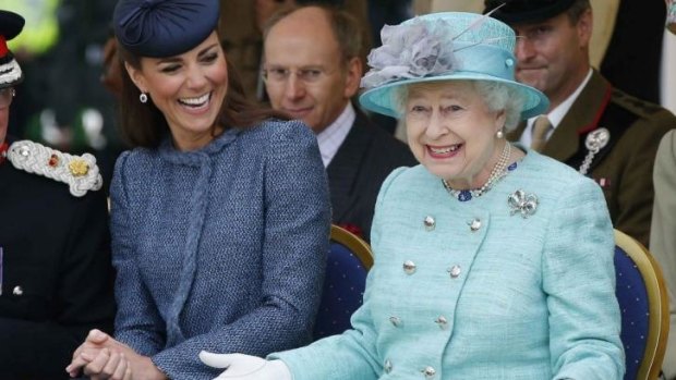 Sharing a laugh and a dress code: Kate, Duchess of Cambridge, and the Queen.