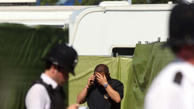Prime Minister's friend dead ... police officers investigate at Glastonbury.
