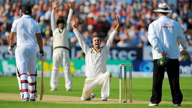 Scalp number four: Nathan Lyon successfully appeals for an lbw decision against Jonny Bairstow.