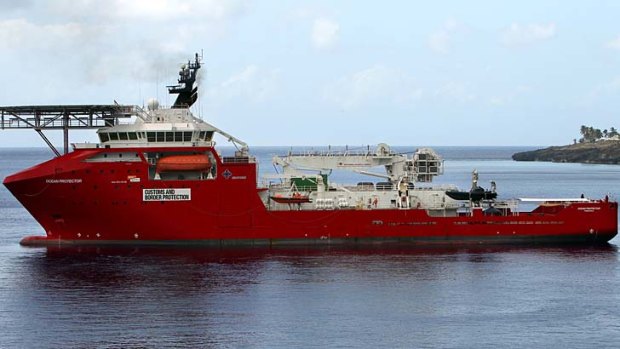 On standby: The Australian Customs and Border Protection vessel Ocean Protector.