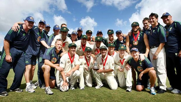 Glittering prizes &#8230; then Australian captain Ricky Ponting, his players and the team's officials show off the Frank Worrell Trophy in Barbados in 2008.