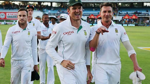 Graeme Smith leads his team off after winning the second Test.
