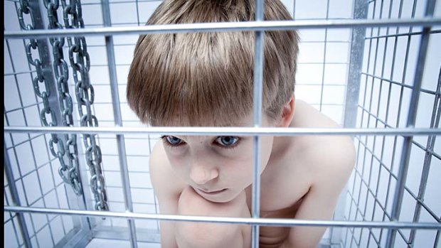 A photograph of an unnamed boy in a cage features in Sean O'Carroll's exhibition about Ritalin.