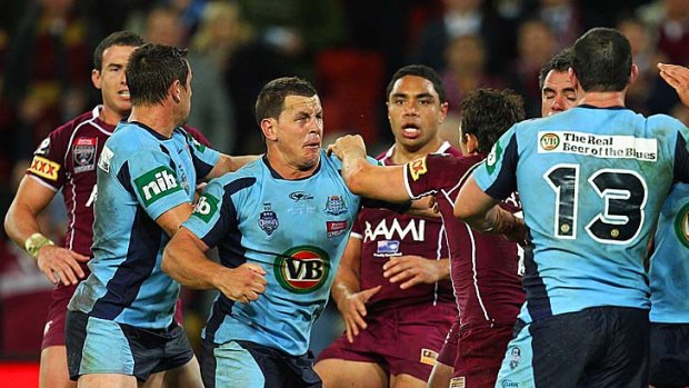 Corey Parker and Greg Bird come to blows at Suncorp Stadium.