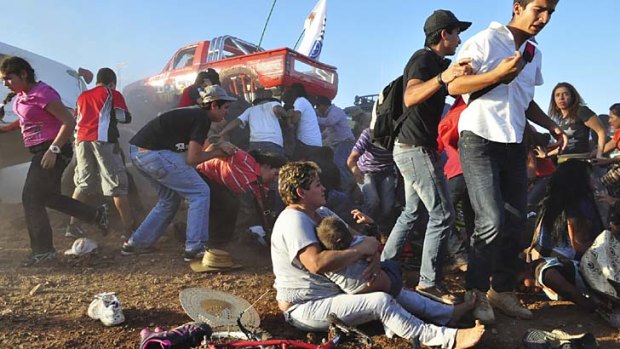 Eight people have died, including four children, and more than 60 spectators were injured.