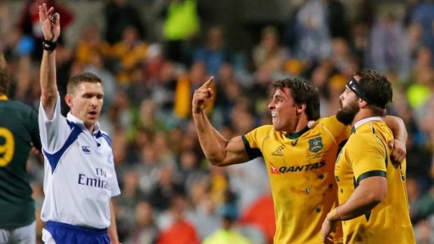 Under fire: Referee George Clancy made some controversial decisions during the Wallabies' match against the Springboks.