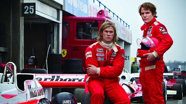 James Hunt (Chris Hemsworth, left) and Niki Lauda (Daniel Bruhl) in a scene from Ron Howard's <i>Rush</i>.