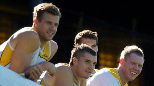 All smiles: Brett Deledio, Dustin Martin and Jack Riewoldt at Richmond training today.