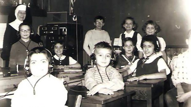 This 1958 photo shows Arthur Budzinski in the second desk in his third grade classroom at St. John's School for the Deaf.