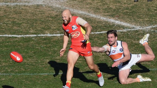 Gary Ablett of the Suns kicks the ball during the round 16 AFL match between the Gold Coast Suns and the Greater Western Sydney Giants.