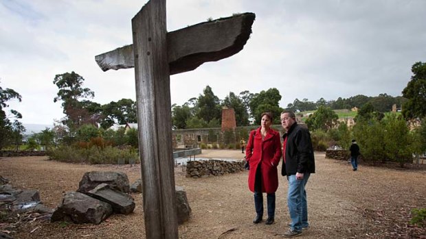 Former police officers Corina and Terry  McCarthy in the Memorial Garden at Port Arthur. Terry was the lead negotiator with Martin Bryant, and Corina helped to identify victims' bodies