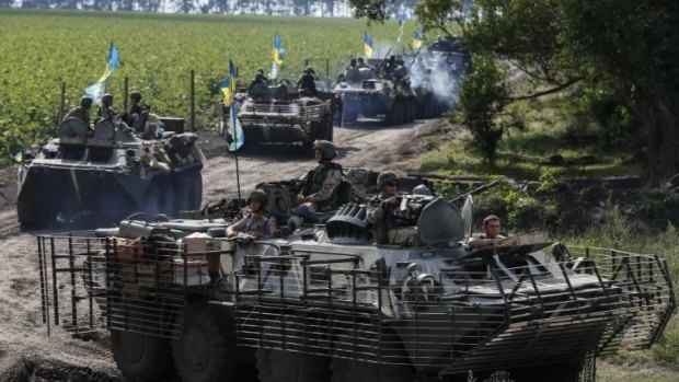 Ukrainian troops continue their offensive against pro-Russian rebels near Slaviansk.