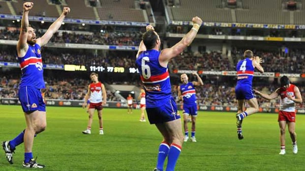 The Western Bulldogs and retiring captain Brad Johnson live to fight another day following their five-point win over Sydney at the MCG last night.