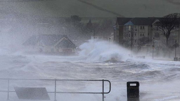 Large seas ... waves crash against the promenade in Largs.