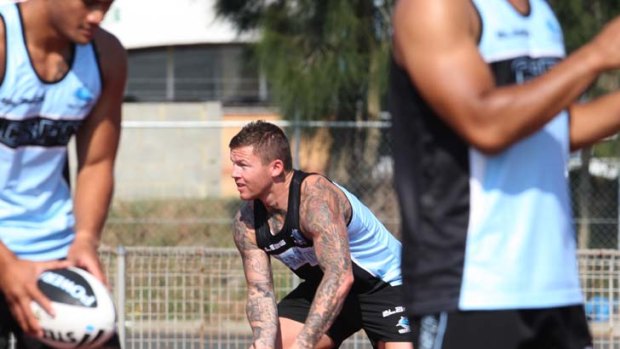 Swimming with the Sharks &#8230; Todd Carney and his new teammates were in Sylvania Waters for their first pre-season training session.