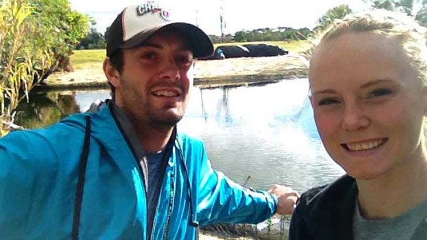 Killed: Christopher Lane with his girlfriend Sarah Harper.