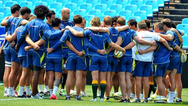 Gee-up &#8230; Nathan Sharpe addresses the squad last week before the South Africa match.