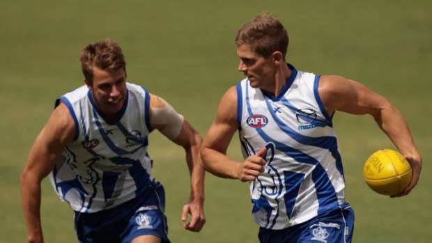 New Roo: Former Saint Nick Dal Santo (right) is among several recruits at the Kangaroos this year.