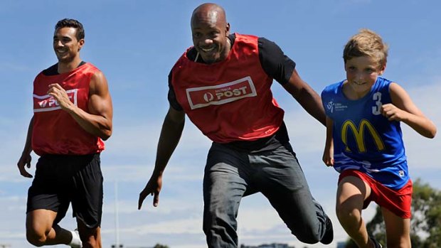 Sprint great: Asafa Powell helps promote the Stawell Gift on Wednesday.