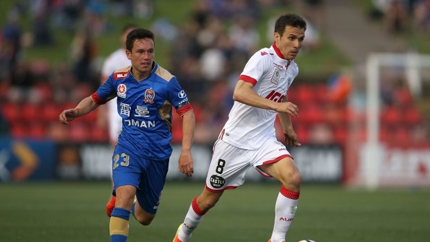 On the move: Isaias dribbles away from Devante Clut.