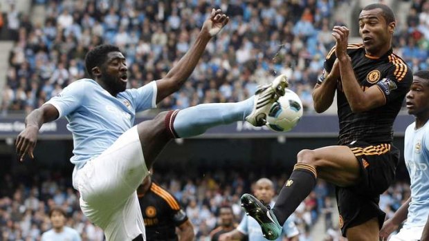 On the move: Kolo Toure has left the Sky Blues bound for Merseyside.
