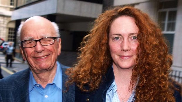 In the eye of the storm ... the chairman of News Corporation, Rupert Murdoch, with chief executive of News International, Rebekah Brooks, in London.