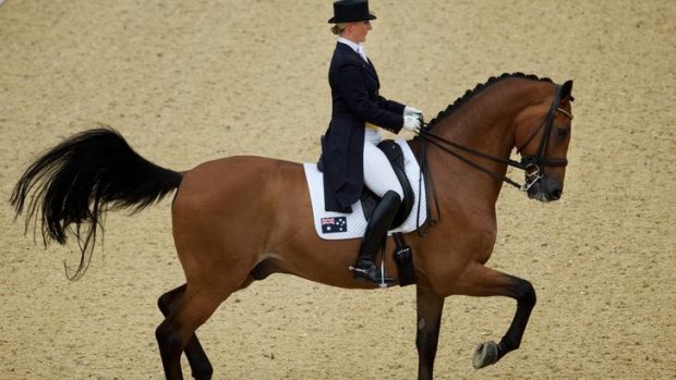 Riding high ... Kristy Oatley on her horse, Clive, competes in the dressage at Greenwich Park, London, on Thursday receiving a score of 68.22.