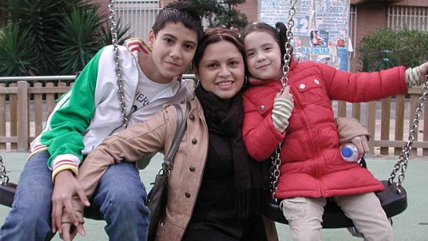 Claudia Castillo, centre, who received a windpipe  transplant that used tissue grown from her own stem cells, with her children.