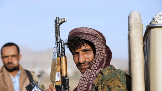 A Houthi fighter near the presidential palace in Sanaa on Thursday.