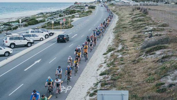 Cyclists ride along West Coast Drive in memory of hit and run victim Brynt McSwain.