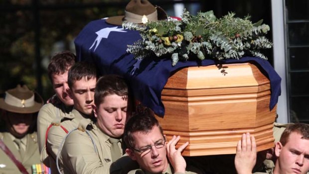 Tribute ... mourners carry Lance Corporal Andrew Jones's coffin.