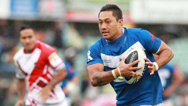 Quentin Togaga'e of Samoa heads for the tryline.