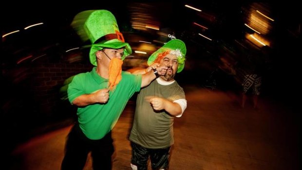 Entertainers JD and Blake Johnston (right) ham it up on St Patrick's Day this year.