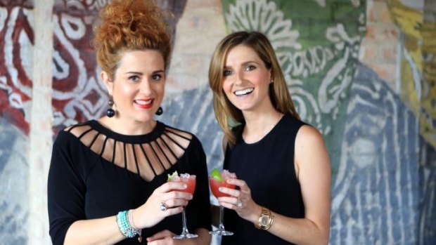 Solo effort: Katie Noonan, left, and Kate Waterhouse toast the successful Pledge Music campaign.