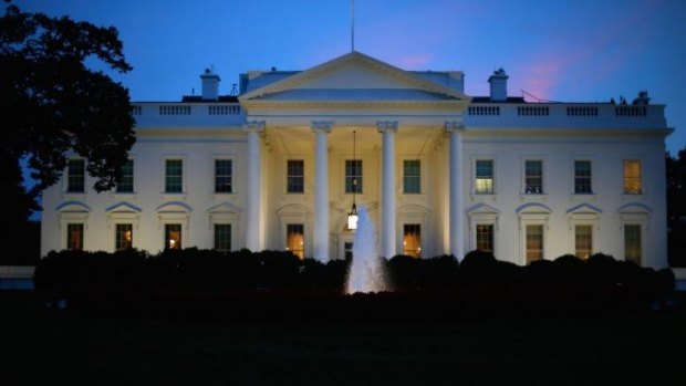 The White House at dusk: President Barack Obama has set out a broad long-term strategy to defeat the Islamic State.