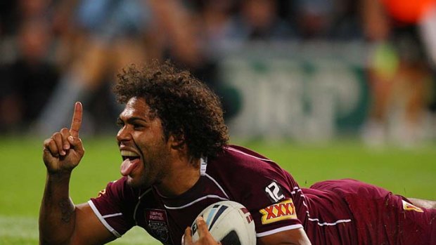 Sam Thaiday celebrates after scoring a try for Queensland during the State of Origin series.